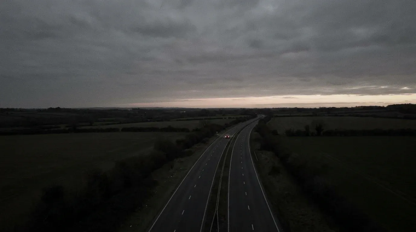 An empty road running through open country