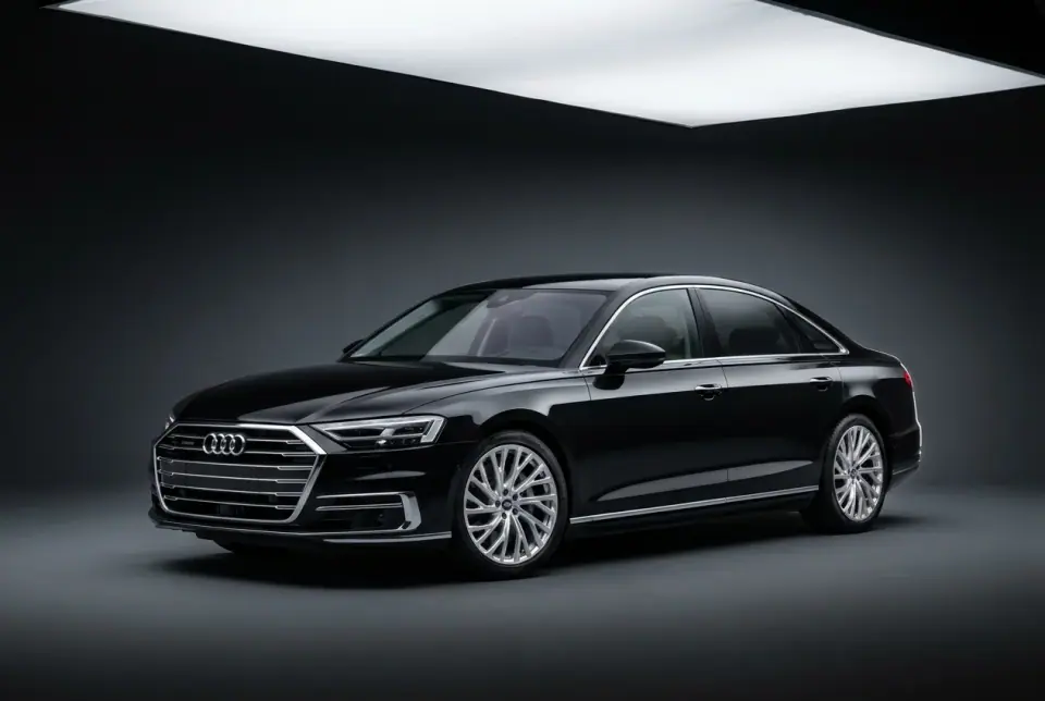 Audi A8 55 TFSI quattro — front three quarter