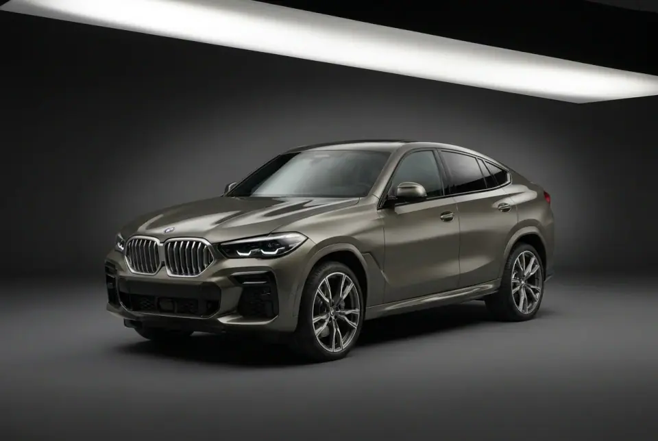 BMW X6 M60i xDrive — front three quarter